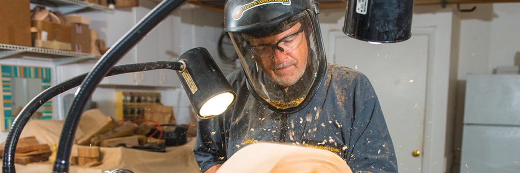 Kent Weakley using a flex arm lamp for woodturning