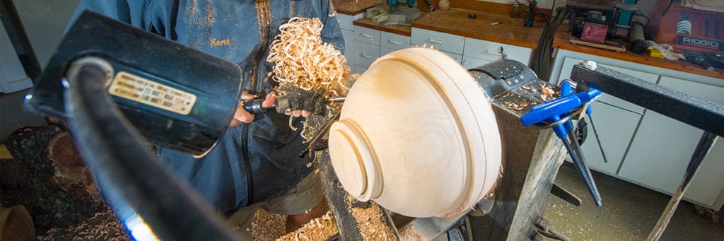 Kent Weakley using a flex arm lamp for woodturning